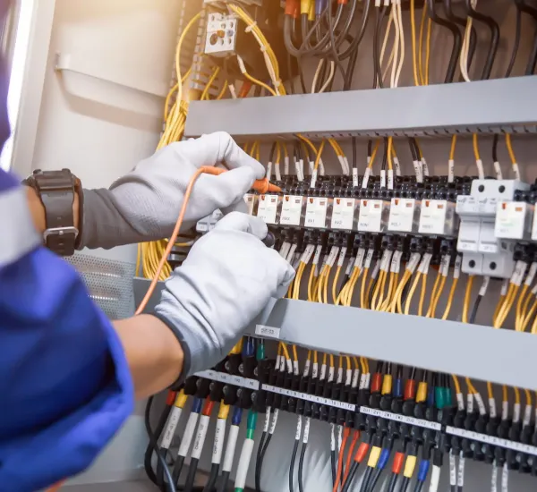 electrician testing control panel